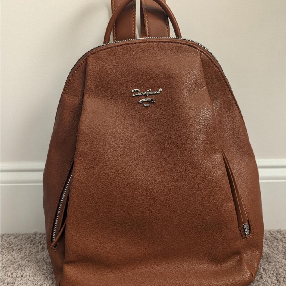 Brown Dome Backpack by Daniel Cremieux